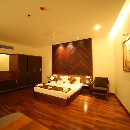 Woodies Bleisure Hotel Kozhikode Buitenkant foto