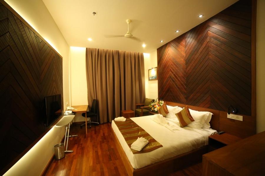Woodies Bleisure Hotel Kozhikode Buitenkant foto