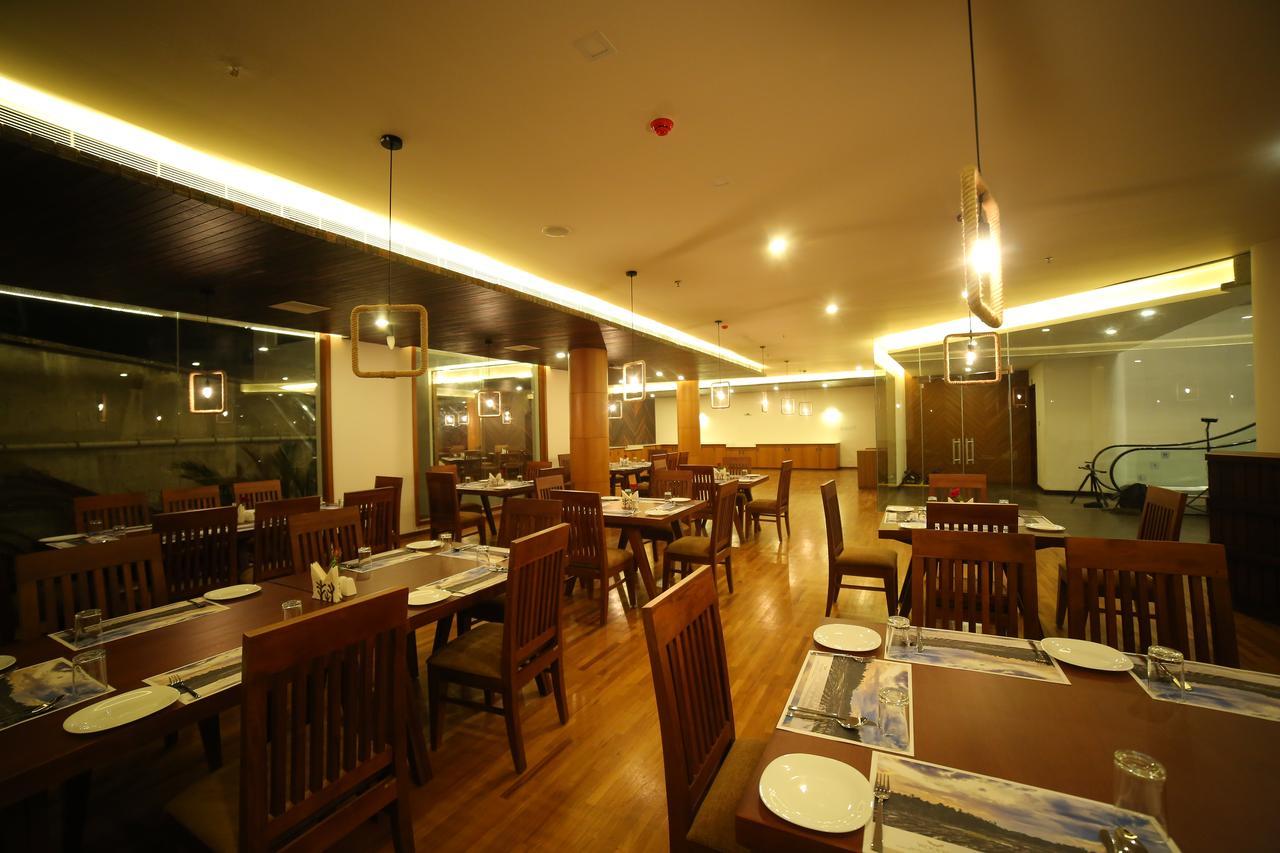 Woodies Bleisure Hotel Kozhikode Buitenkant foto