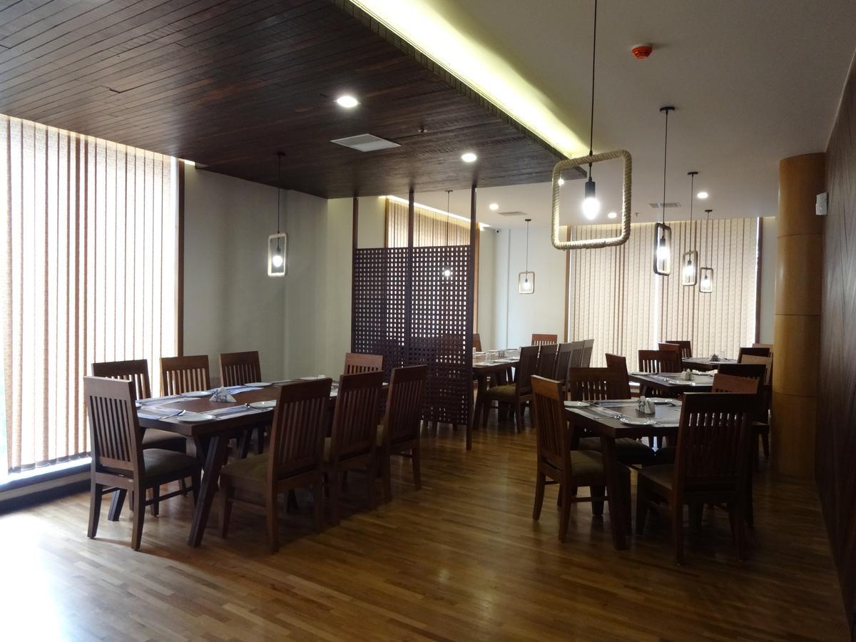 Woodies Bleisure Hotel Kozhikode Buitenkant foto