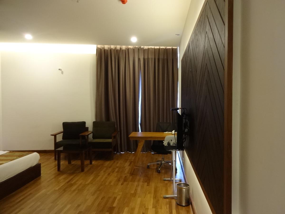 Woodies Bleisure Hotel Kozhikode Buitenkant foto