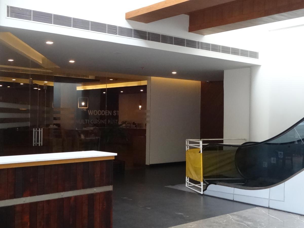 Woodies Bleisure Hotel Kozhikode Buitenkant foto