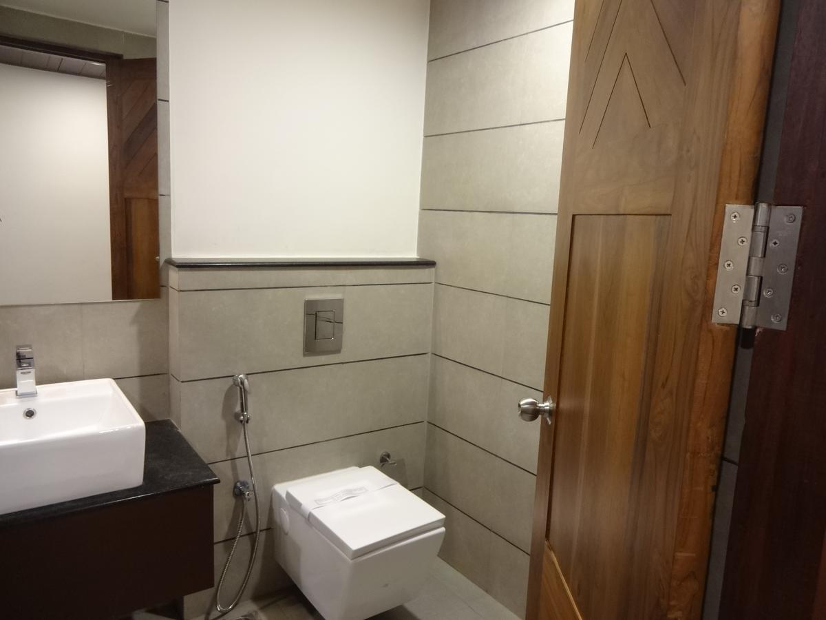Woodies Bleisure Hotel Kozhikode Buitenkant foto
